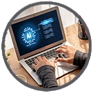 A person typing on a laptop displaying an AI interface, highlighting technology and innovation at a wooden desk.