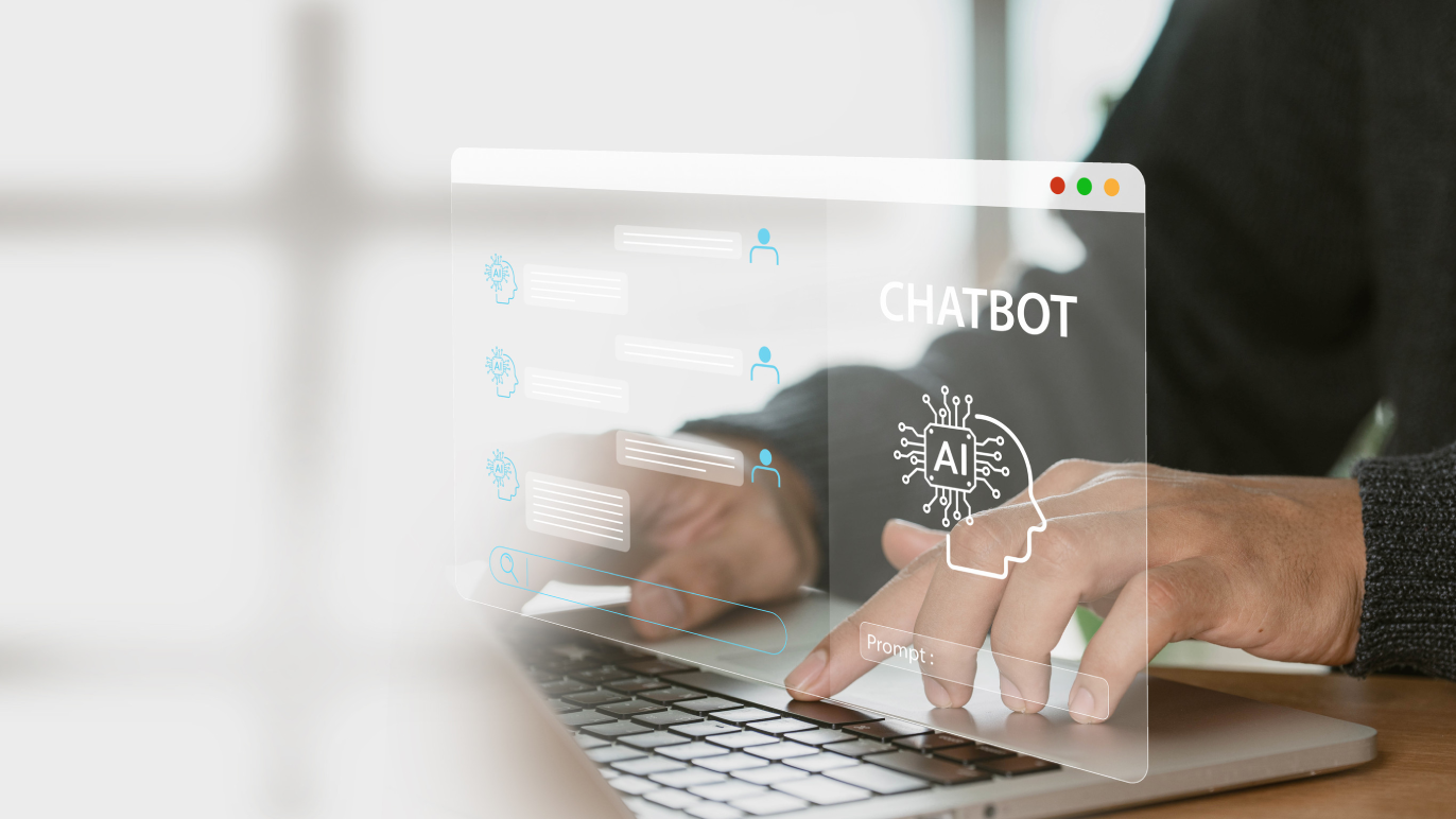 A businessman uses his home computer to show a virtual image chat with artificial intelligence (AI). transforming futuristic technology with the use of the command prompt.<br />
